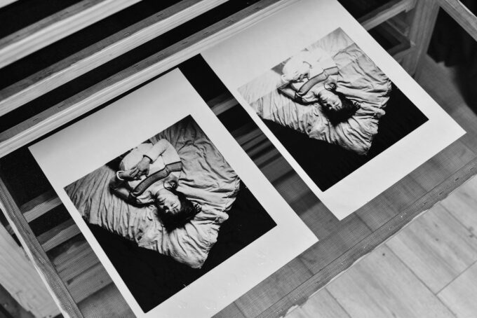 A hand B&W Print being dried in the darkroom